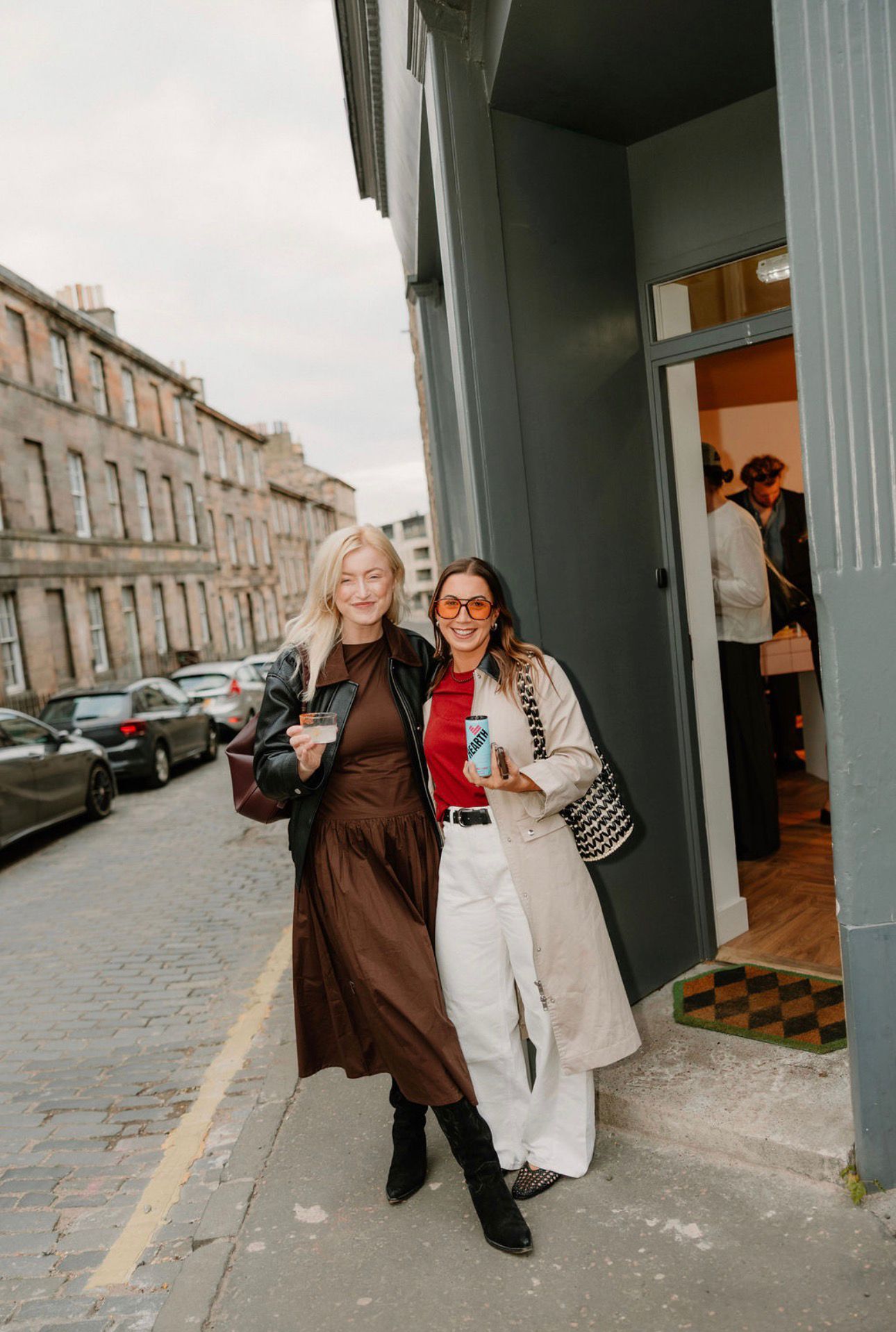 Two guests outside the Combined. salon door
